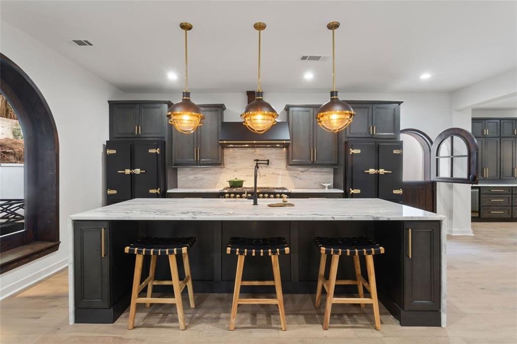 Kitchen island and statement lighting - The Villa Project